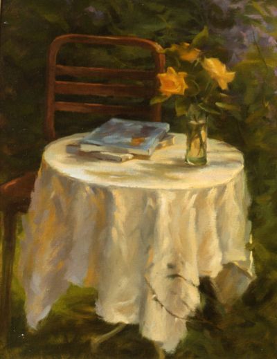 Round White Table in Summer Sun